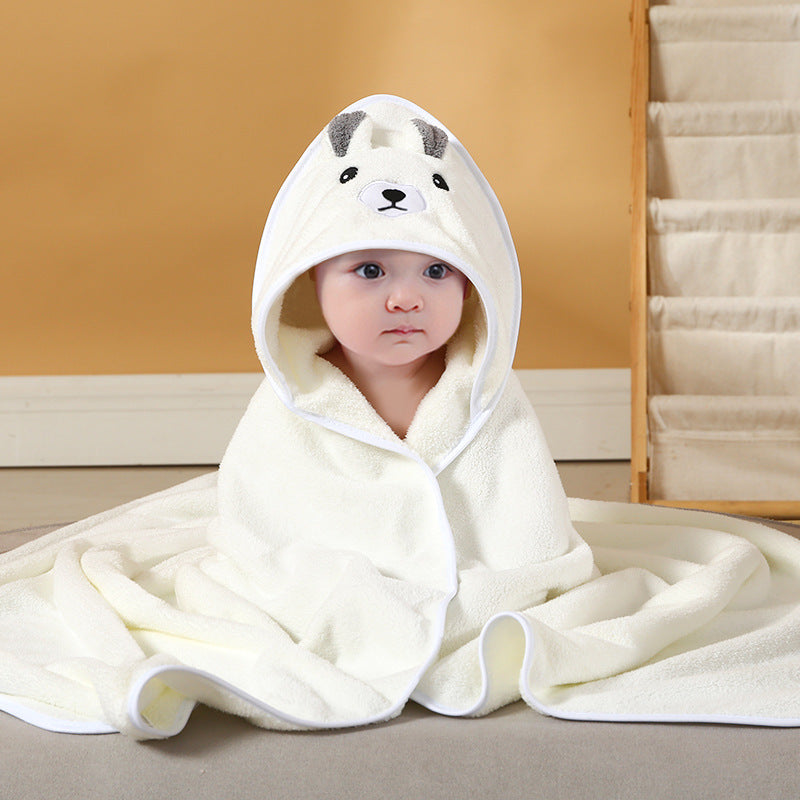 Baby cuddled in coral fleece cape