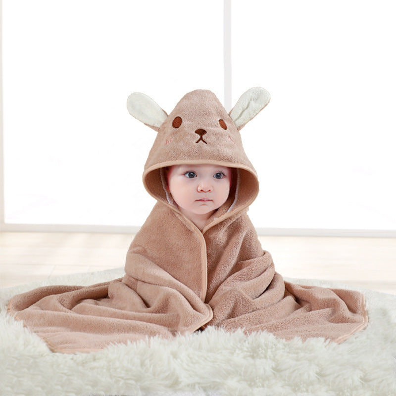Baby cuddled in coral fleece cape