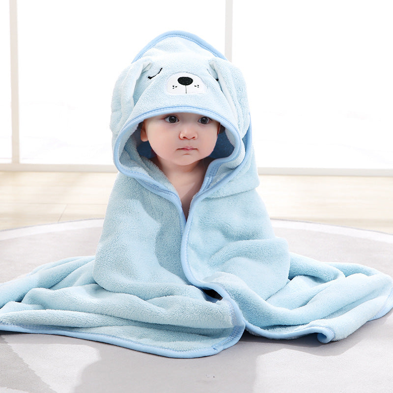 Baby cuddled in coral fleece cape