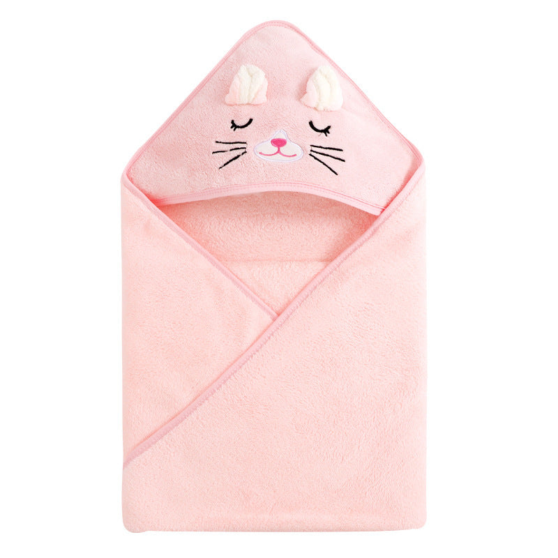Baby cuddled in coral fleece cape