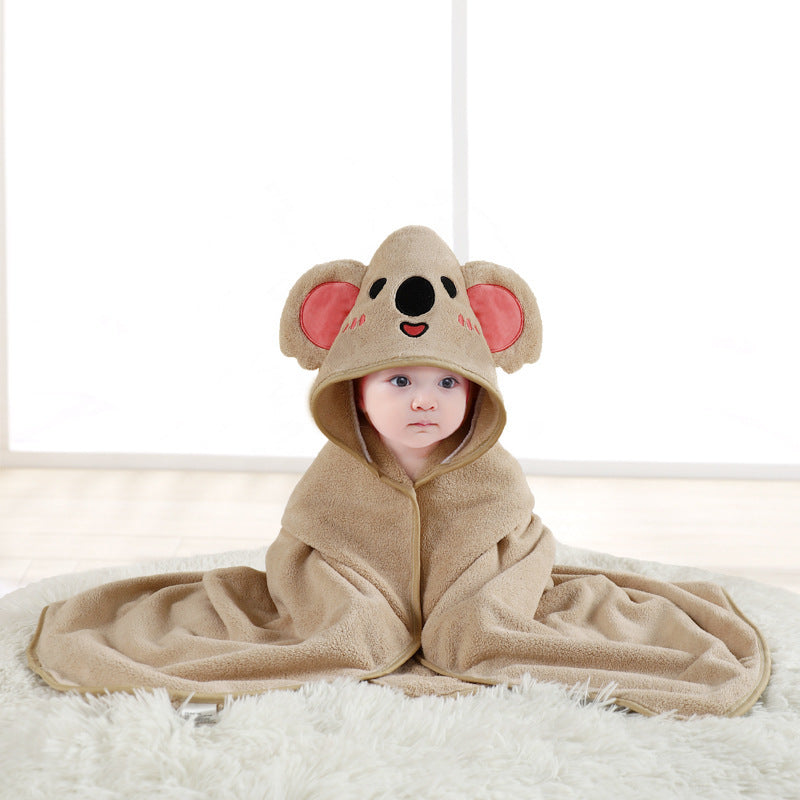 Baby cuddled in coral fleece cape