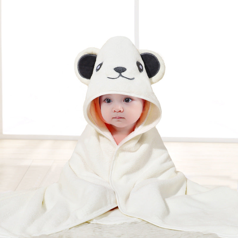 Baby cuddled in coral fleece cape