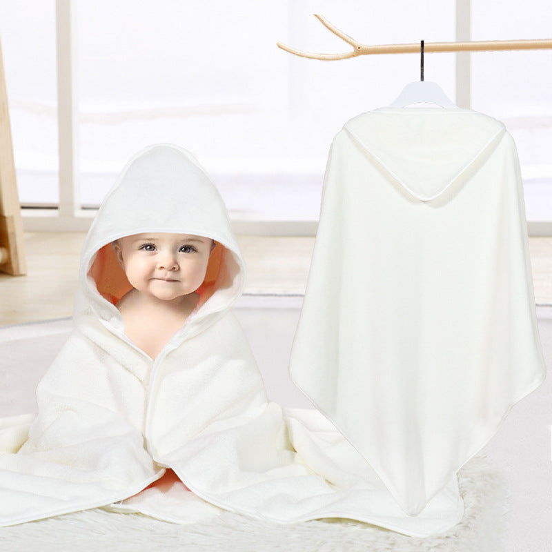 Baby cuddled in coral fleece cape
