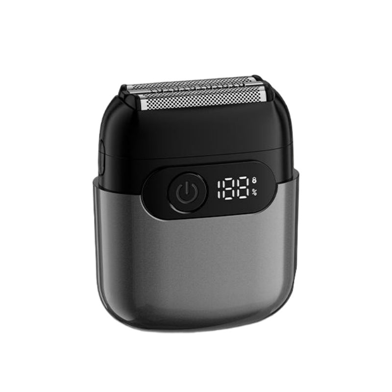 Portable reciprocating electric shaver