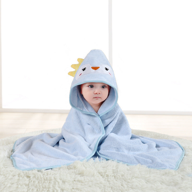 Baby cuddled in coral fleece cape