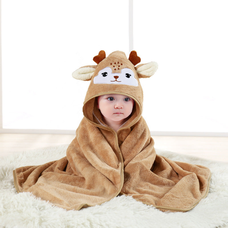 Baby cuddled in coral fleece cape